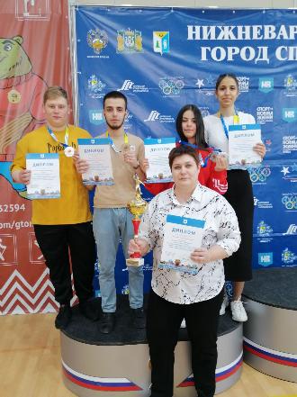 Победа в соревнованиях по  настольному теннису 
